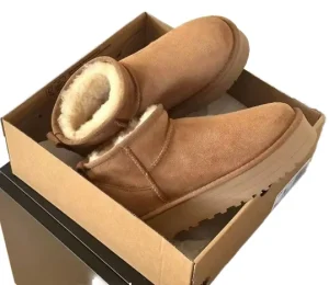 Winter New Thick soled Sheepskin One piece Snow Boots Women’s Plush lined Comfortable Rubber Outsole Ankle Bootie Toe