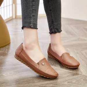 Women’s Brown PU Leather Slip-On Loafers Hand Stitched Moccasins with Rhinestone Flower TPR Flat Sole Casual Shoes
